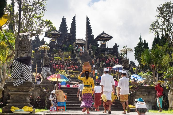 Bali Private Driver at Besakih Temple entrance with Mount Agung in the background