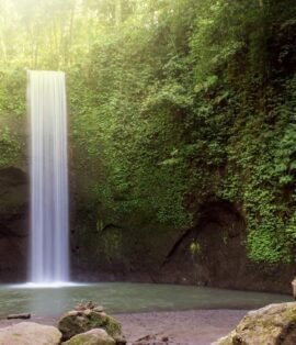 Tibumana Waterfall hidden gem in Ubud surrounded by jungle trees.jpg